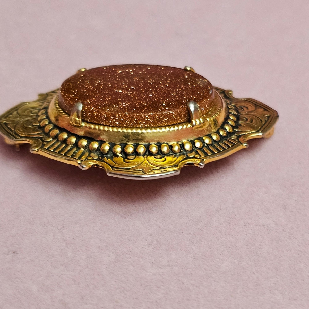 (734) Vintage Goldstone Oval Gold-Tone Ornate Brooch Classic Victorian-Inspired
