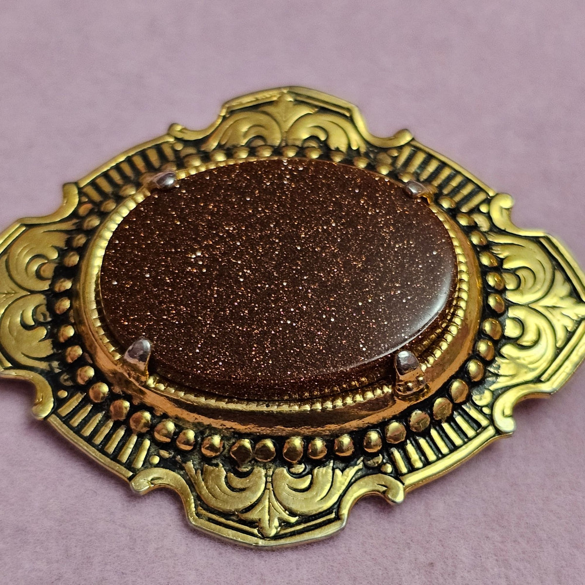 (734) Vintage Goldstone Oval Gold-Tone Ornate Brooch Classic Victorian-Inspired
