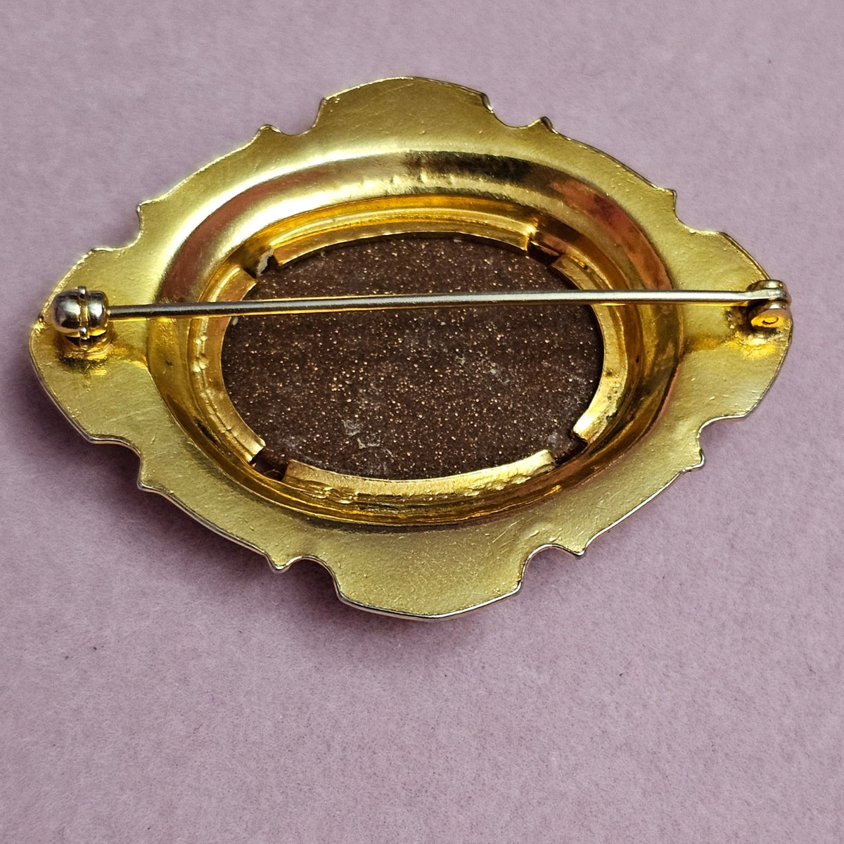 (734) Vintage Goldstone Oval Gold-Tone Ornate Brooch Classic Victorian-Inspired