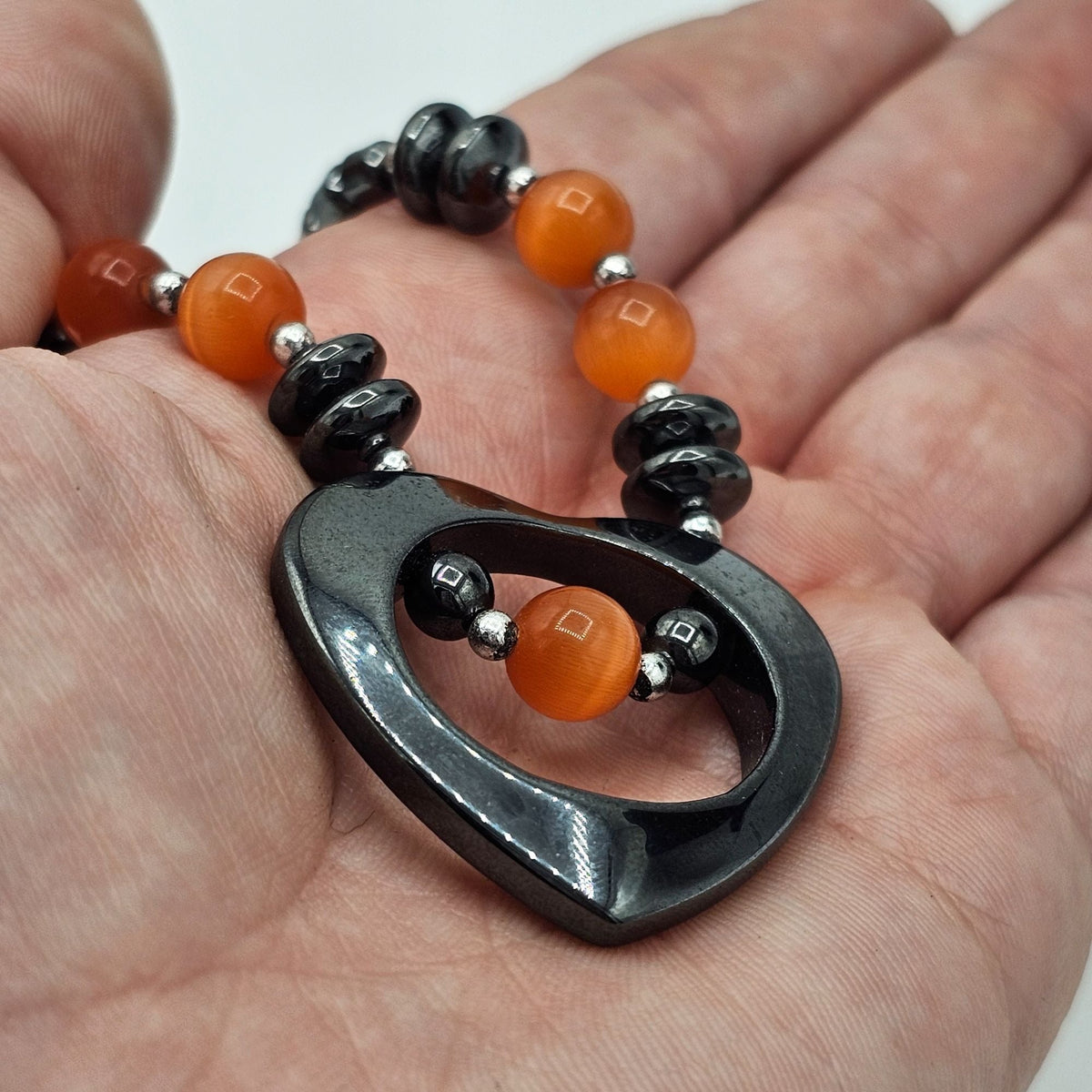 Vintage Hematite Beaded Necklace with Heart Pendant Orange Moonglow Beads