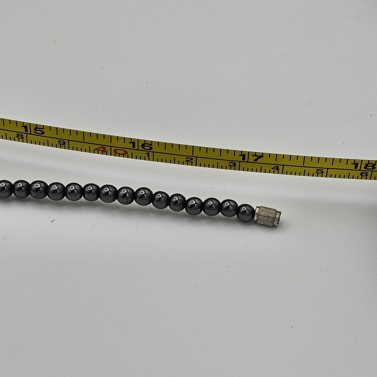 (146) Vintage Black Hematite Beaded Necklace Heart in the Center of a Ring