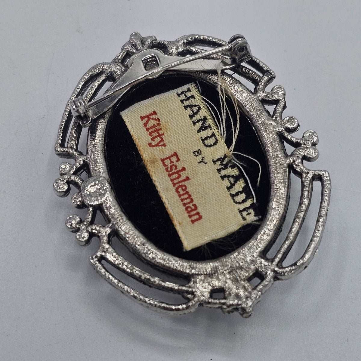 Vintage Handmade Kitty Eshleman Oval Brooch Filigree Paper Scrolls Glass Dome