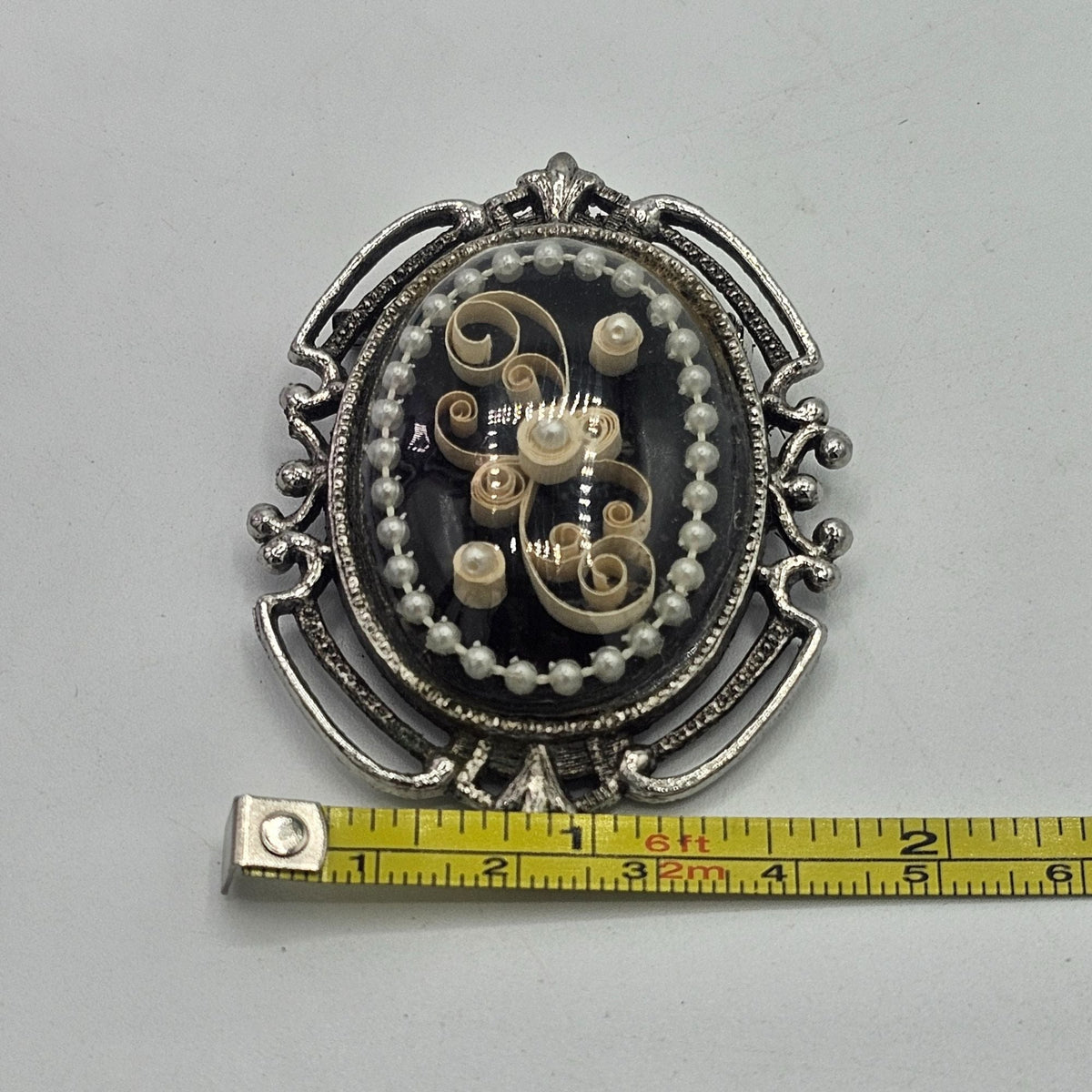 Vintage Handmade Kitty Eshleman Oval Brooch Filigree Paper Scrolls Glass Dome