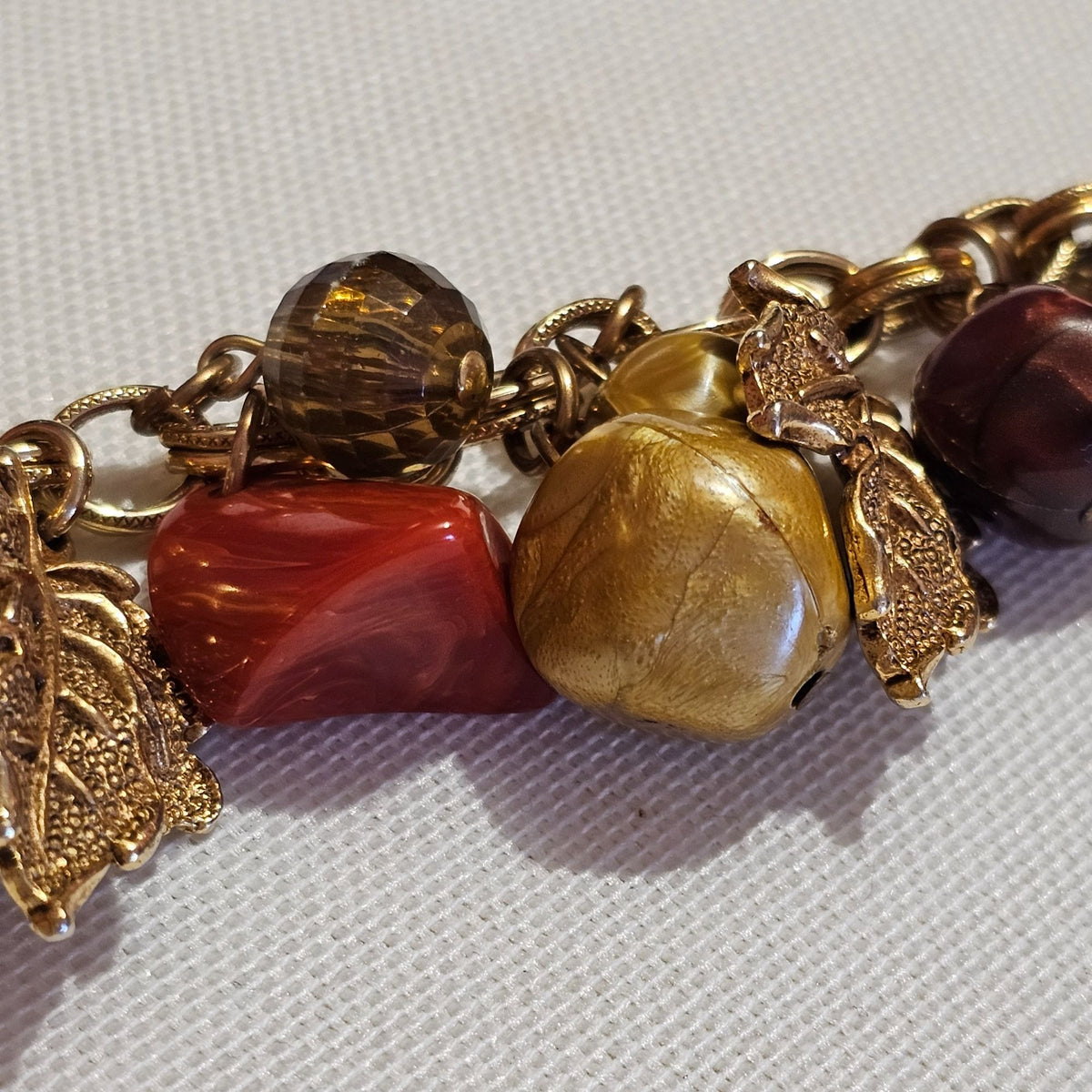 (642) Gold-Tone Autumn Leaf Berry Charm Bracelet Neutral Beads Fall Inspired Design