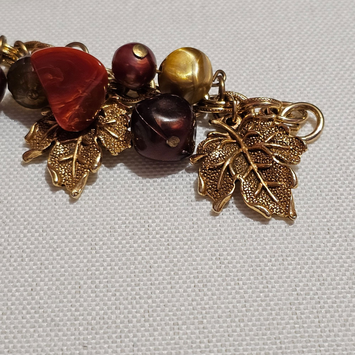 (642) Gold-Tone Autumn Leaf Berry Charm Bracelet Neutral Beads Fall Inspired Design