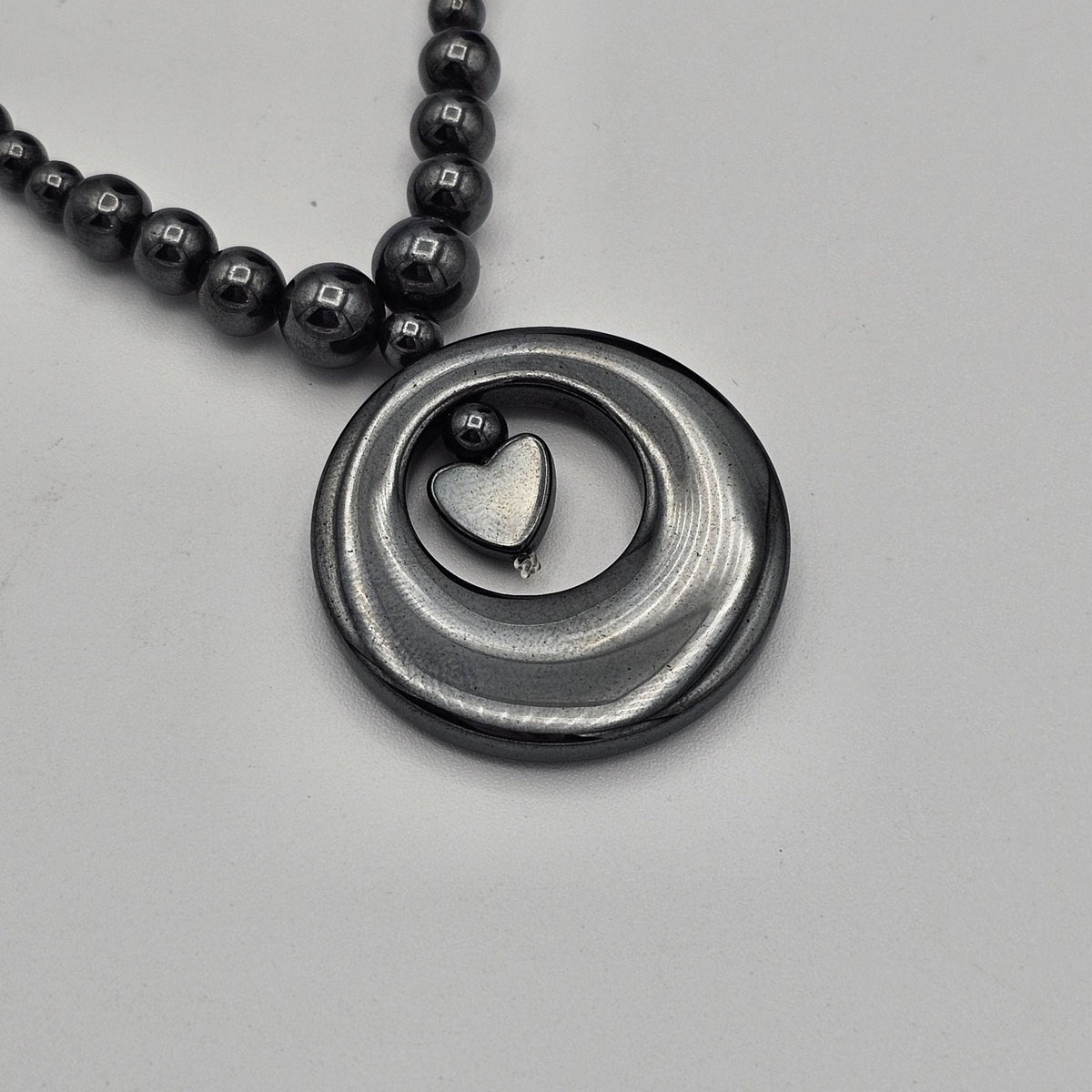 (146) Vintage Black Hematite Beaded Necklace Heart in the Center of a Ring