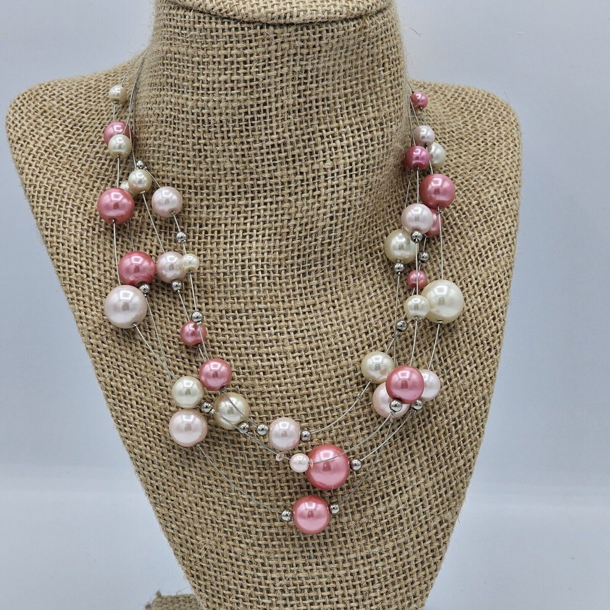 (691) Pink Cream Faux Pearl Floating Illusion Necklace 4 Strands Silver-tone Wire