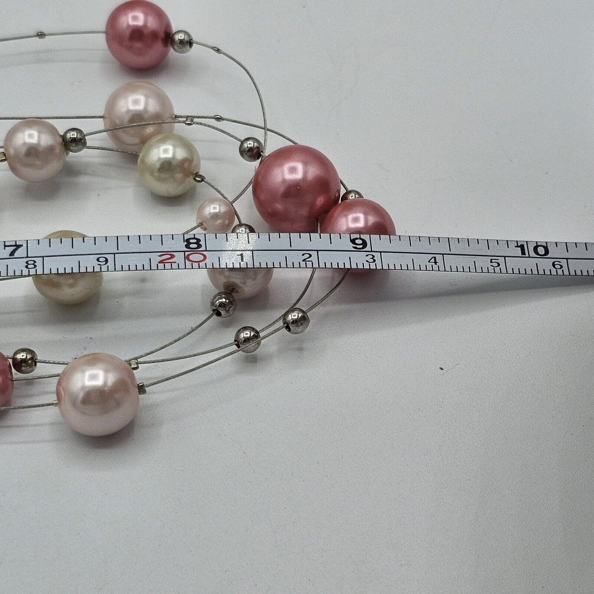 (691) Pink Cream Faux Pearl Floating Illusion Necklace 4 Strands Silver-tone Wire
