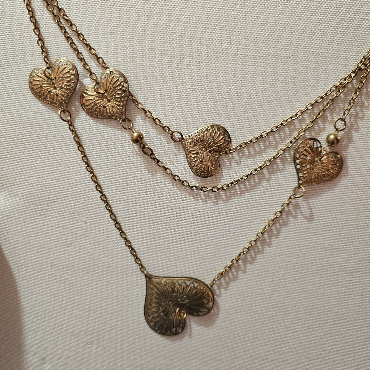 (656) Extra Long Multi Heart Layered Chain Brass Colored Necklace Valentines
